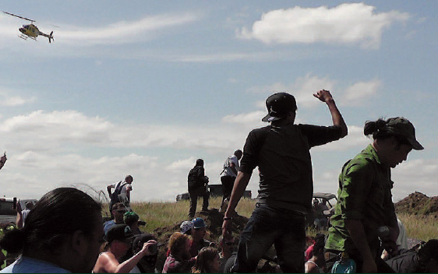 Protesters force bulldozers off sacred site